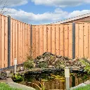 Red Class Tanger vuren schutting scherm de vier keien.webp