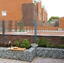 noors-graniet-breuksteen-in-schanskorf.webp